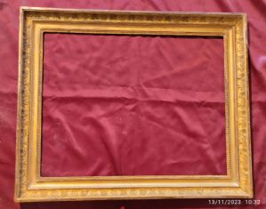 Cornice Impero francese in legno dorato e con eleganti decori a pastiglia  I° XIX° sec. luce cm.44x54